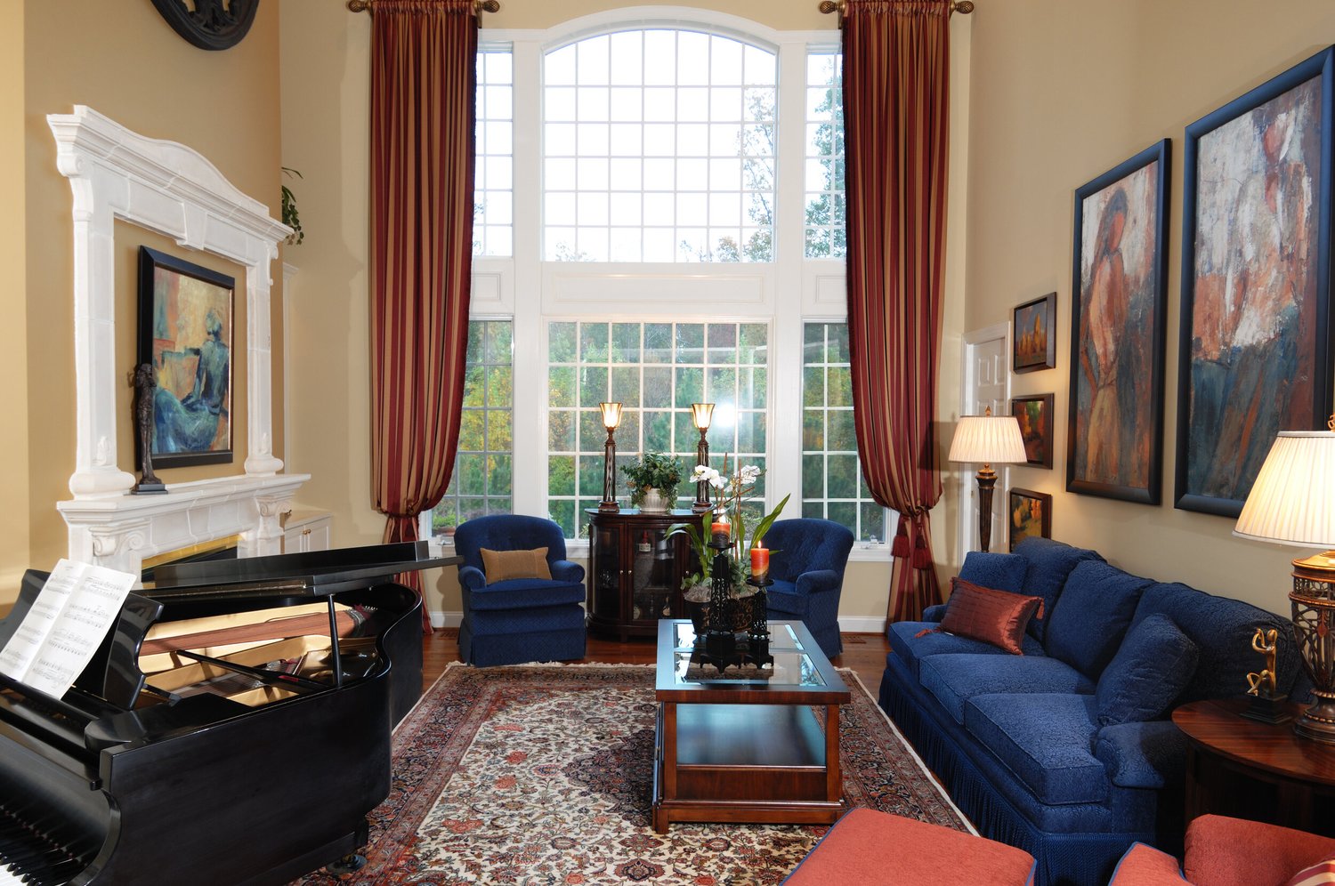 Two-story living room with grand piano